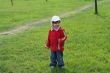 little girl is walking in the park