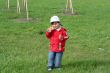 little girl is walking in the park