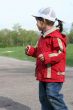 little girl is walking in the park