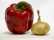 Pepper and onions on a white background.