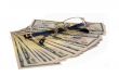 Lot of dollars and glasses