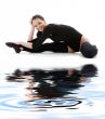 fitness black leotard on white sand #4
