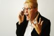 Angry Business Woman on Cell Phone