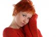 sad red haired woman isolated on white background