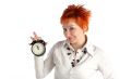 cheerful business woman with clock. Planning and organization concept