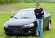 man against car