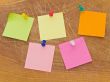 Stickers and notes at the drowing pins