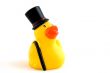 rubber duck with big black hat