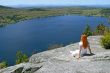 Young woman enjoying the view over lake