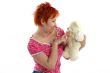 red haired woman with teddy bear isolaited on white background
