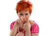 Crying young red haired woman isolaited on white background