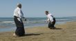 training of Aikido on the beach
