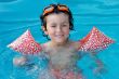 Child in the pool on holiday