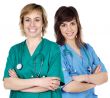 Two young  women doctors