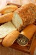 assortment of baked bread and other bakery products