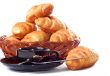 cup of coffee with fresh croissants