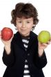 Child eating two apples