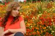 girl in red in beautiful gardens