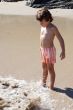 boy playing in the beach
