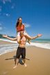 couple playful by the beach