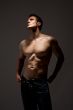 handsome topless man in jeans