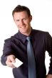 caucasian businessman presenting business card