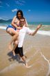 lovers having fun at the beach