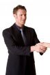 caucasian man in business suit making a hand shake