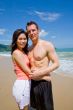 young couple by the beach