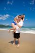 lovers having fun at the beach