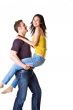 caucasian man carrying his girlfriend