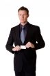 caucasian businessman in formal attire showing business card