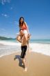 couple playful by the beach