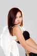 woman with white angel wings lookiing sexy