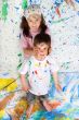 Friends playing with painting