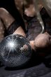 fishnet stockings and disco ball