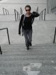 female walking up stairs