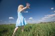 little girl on sunny meadow