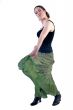 Woman with long curly hair in a dress dancing