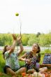 Throwing an apple