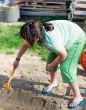 Girl Playing In Sand