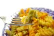 plate of  tricolor macaronis and plug