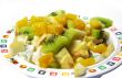 Fruit salad in a plate isolated on a white