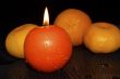  mandarins, orange and candle