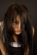 Sensual girl looking through hair