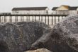 Rocks in front of the pier