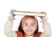 Girl holding book on head