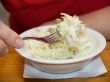 Woman eating salad