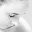 Up close and personal portrait looking sown in black and white