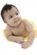 Sweet baby with a yellow blanket